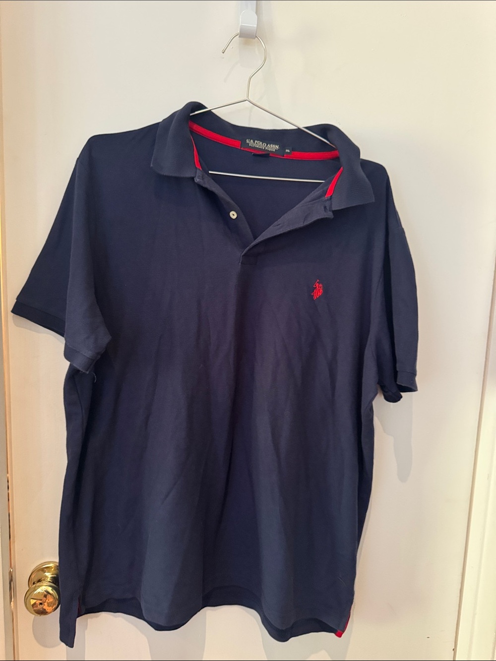 US Polo Assn Men’s Dark Blue Polo with Red Accents